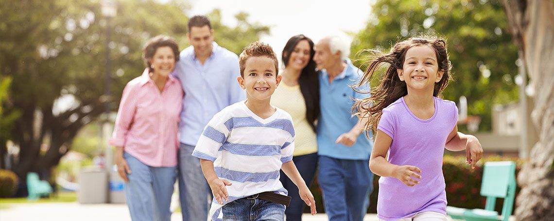 Happy family satisfied with their financial planning for their children