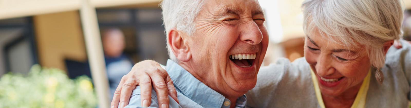 mature couple happy with their wealth management services at NAM Advisors